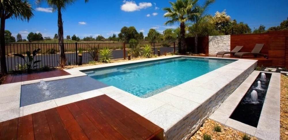 Pool built partially above the ground with Sunpod